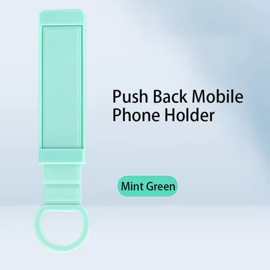 Mint green push back mobile phone holder on a light blue background